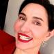 Eliza VanCort House Fellow Smiling with Red Lipstick
